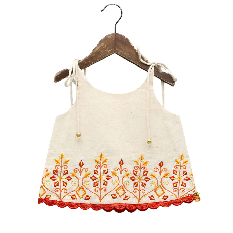 Twirl & Bloom: Tie-Up Strappy Embroidered Top with Tiered Lehenga