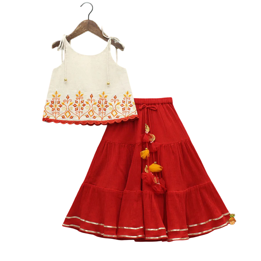 Twirl & Bloom: Tie-Up Strappy Embroidered Top with Tiered Lehenga
